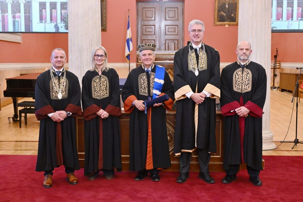 Emeritus Professor Clyde Williams, OBE, Receives the Title of Doctor Honoris Causa of the School of Physical Education and Sport Science